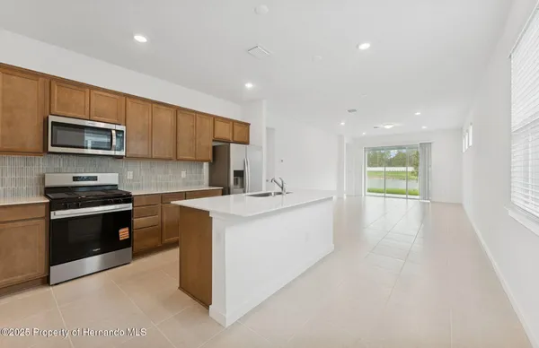 Property Slideshow image 3 of 31 | 13741 cyn rdg rd, Shady Hills, FL, 34610