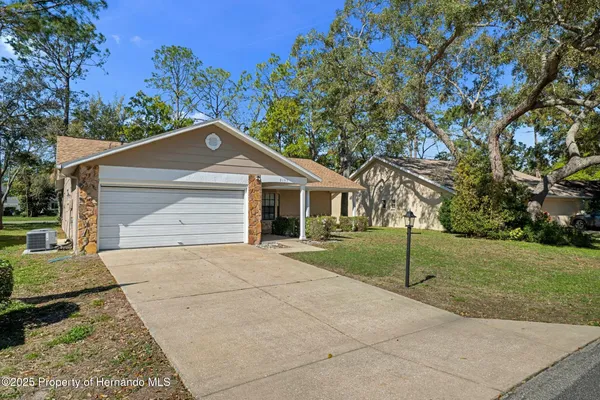 Property Slideshow image 3 of 65 | 2193 pebble beach dr, Spring Hill, FL, 34606