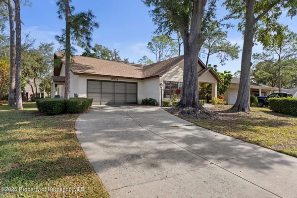 Property Slideshow image 2 of 63 | 2221 timber lodge ln, Spring Hill, FL, 34606