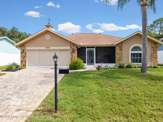 Property Slideshow image 3 of 76 | 6558 pine meadows dr, Spring Hill, FL, 34606