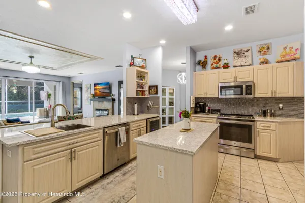 Property Slideshow image 3 of 47 | 5466 legend hills ln, Brooksville, FL, 34609