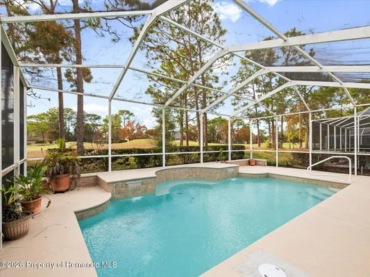 Property Slideshow image 3 of 61 | 5501 legend hills ln, Spring Hill, FL, 34609