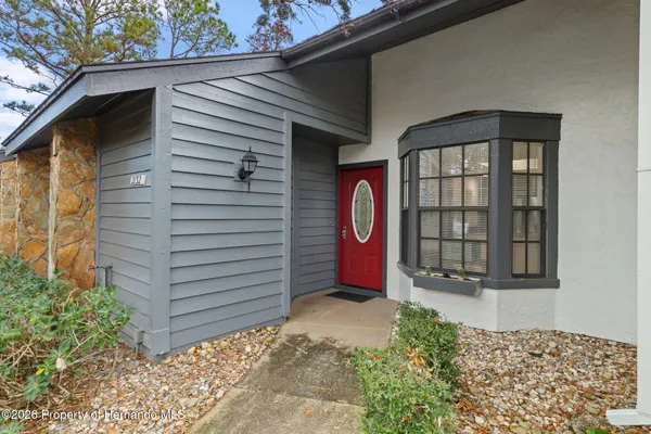 Property Slideshow image 2 of 38 | 2132 sea pines ct, Spring Hill, FL, 34606