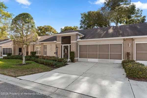 Property Slideshow image 3 of 87 | 2470 hidden trail dr, Spring Hill, FL, 34606