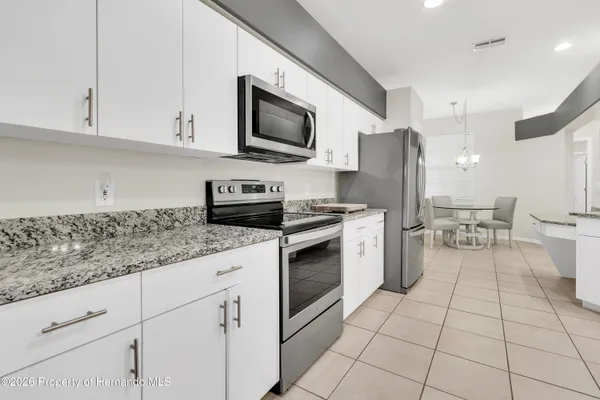 Property Slideshow image 2 of 71 | 14425 sterling run, Spring Hill, FL, 34609