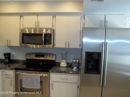 Property Slideshow image 3 of 23 | 3143 cloister ct, Spring Hill, FL, 34606