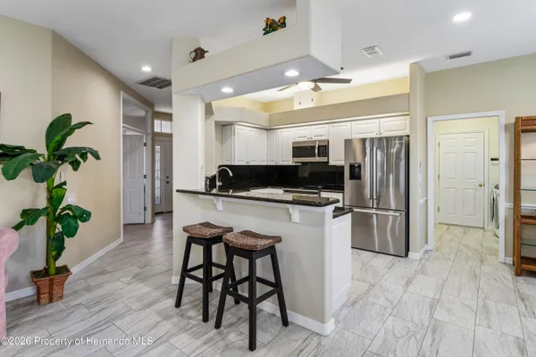 Property Slideshow image 2 of 74 | 14465 middle fairway dr, Spring Hill, FL, 34609
