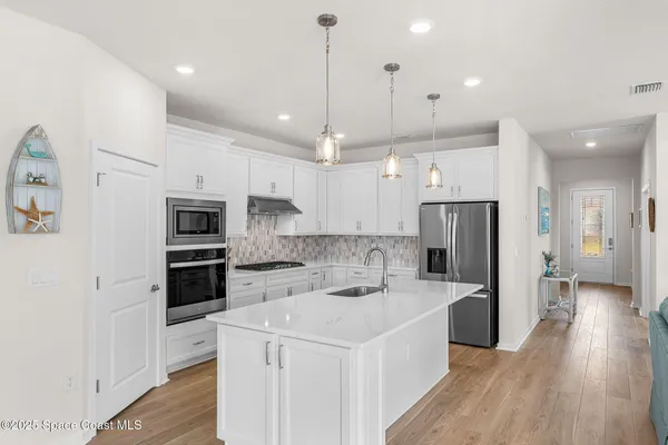 Property Slideshow image 2 of 65 | 8870 shoreline ave, Melbourne, FL, 32940