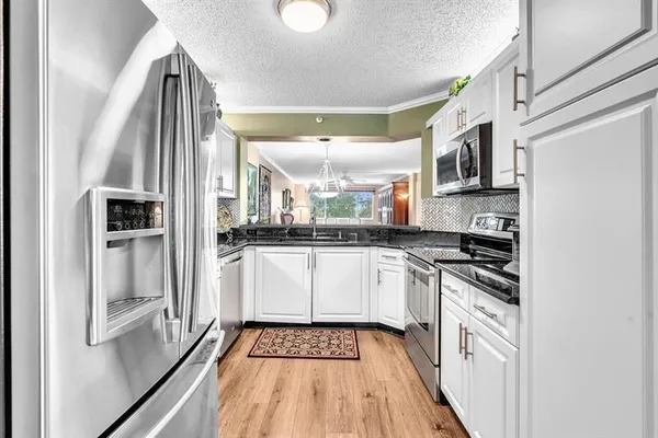 Property Slideshow image 3 of 75 | 9587 weldon cir b311, Tamarac, FL, 33321