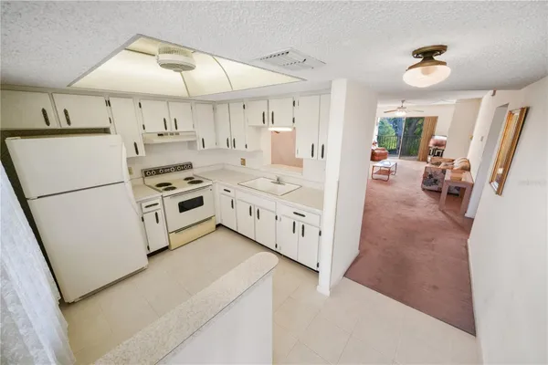 Property Slideshow image 3 of 16 | 1450 heather ridge blvd 307, Dunedin, FL, 34698