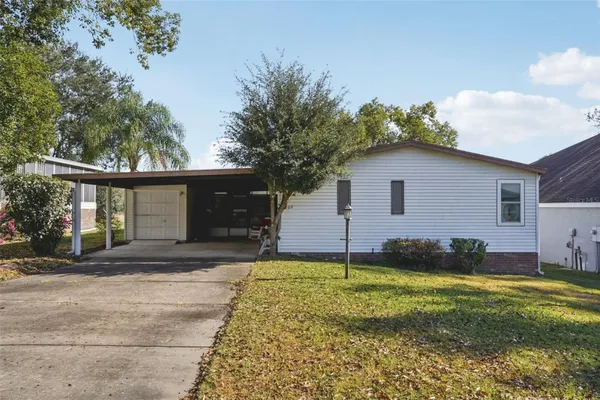 Property Slideshow image 3 of 45 | 1409 torrey pines dr, The Villages, FL, 32159