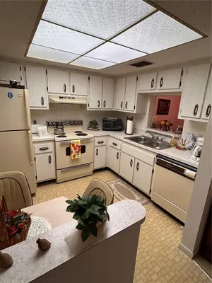 Property Slideshow image 2 of 6 | 1415 doolittle ln 307, Dunedin, FL, 34698