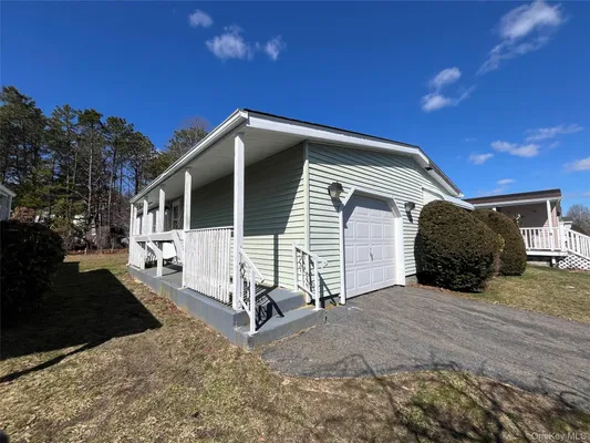 Property Slideshow image 2 of 9 | 75 village cir, Brookhaven, NY, 11949