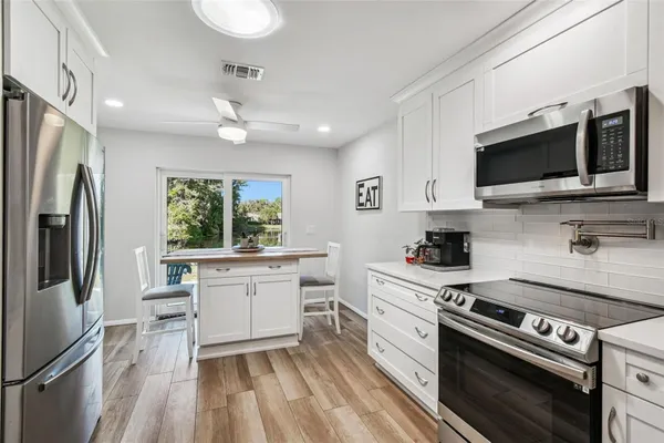 Property Slideshow image 3 of 49 | 11539 scotch pine dr, New Port Richey, FL, 34654