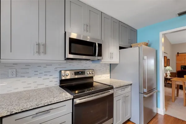 Property Slideshow image 3 of 91 | 1065 tartan dr c, Palm Harbor, FL, 34684