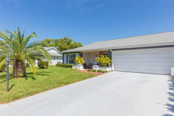 Property Slideshow image 3 of 40 | 8423 pebble dr, Port Richey, FL, 34668