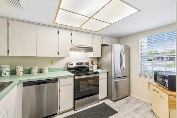 Property Slideshow image 2 of 36 | 11340 carriage hill dr 4, Port Richey, FL, 34668