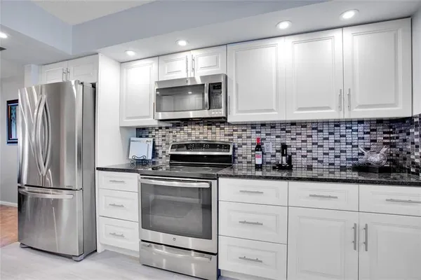 Property Slideshow image 3 of 33 | 1702 andros isle apt e1, Coconut Creek, FL, 33066