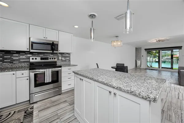 Property Slideshow image 3 of 58 | 7600 sun island dr 107, South Pasadena, FL, 33707