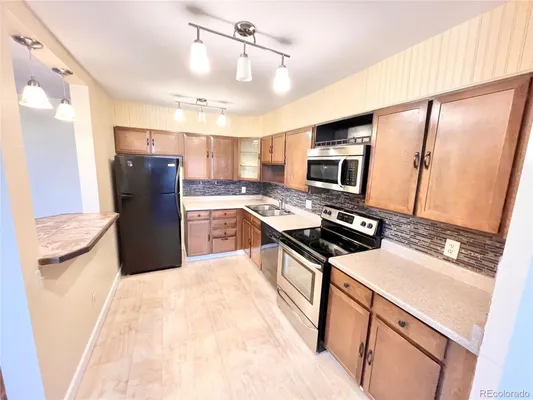 Property Slideshow image 3 of 18 | 9335 e center ave 8b, Denver, CO, 80247