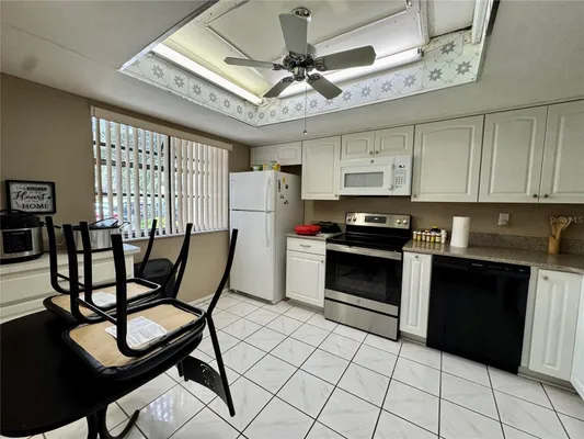 Property Slideshow image 3 of 25 | 11231 dollar lake dr apt 1, Port Richey, FL, 34668