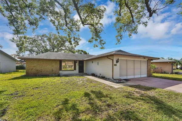 Property Slideshow image 3 of 35 | 10800 los santos dr, Port Richey, FL, 34668