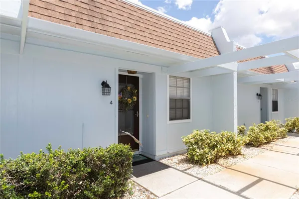 Property Slideshow image 2 of 43 | 11140 carriage hill dr 4, Port Richey, FL, 34668