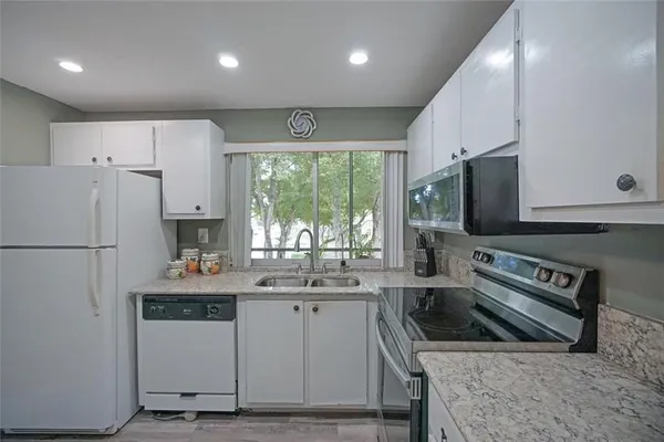 Property Slideshow image 2 of 32 | 9101 lime bay blvd apt 308, Tamarac, FL, 33321