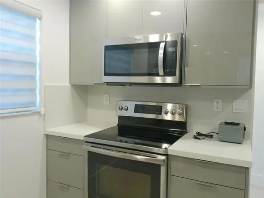 Property Slideshow image 3 of 23 | 6085 n sabal palm blvd 109, Tamarac, FL, 33319