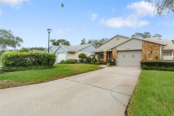 Property Slideshow image 2 of 51 | 11719 rose tree dr, New Port Richey, FL, 34654