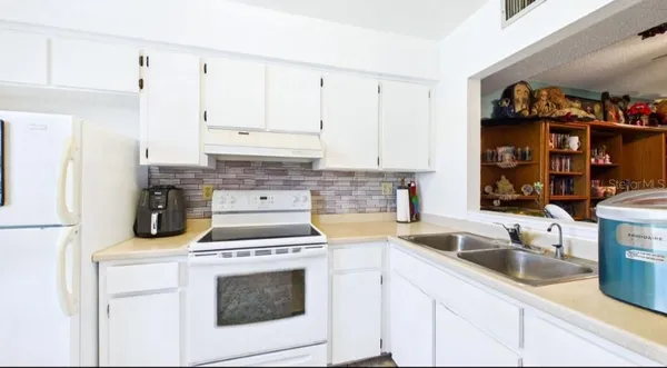 Property Slideshow image 3 of 32 | 11117 pembridge ct 2, Port Richey, FL, 34668