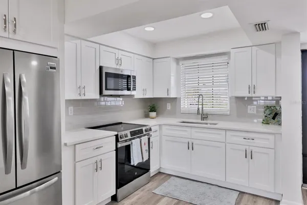 Property Slideshow image 3 of 29 | 102 46th avenue ter w apt 402, Bradenton, FL, 34207