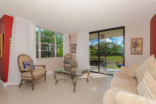 Property Slideshow image 2 of 26 | 1200 saint charles pl l19, Pembroke Pines, FL, 33026