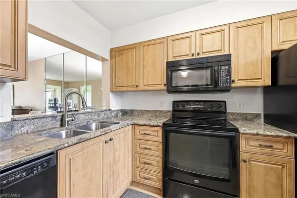 Property Slideshow image 3 of 48 | 7406 lake breeze dr 218, Fort Myers, FL, 33907