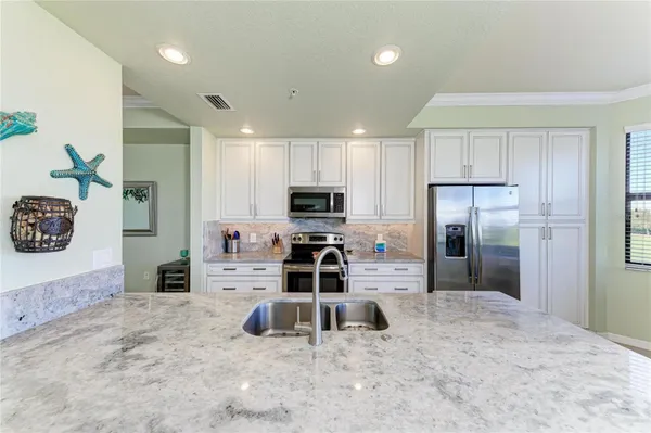 Property Slideshow image 3 of 80 | 7121 river hammock dr unit 306, Bradenton, FL, 34212