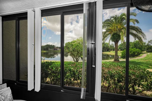 Property Slideshow image 2 of 77 | 1870 pine ridge way g1, Palm Harbor, FL, 34684