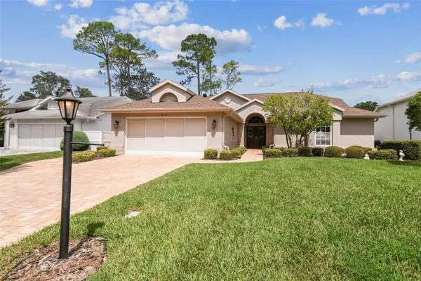 Property Slideshow image 3 of 86 | 8157 hidden hills dr, Spring Hill, FL, 34606