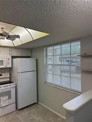 Property Slideshow image 3 of 36 | 821 patricia ave 106, Dunedin, FL, 34698