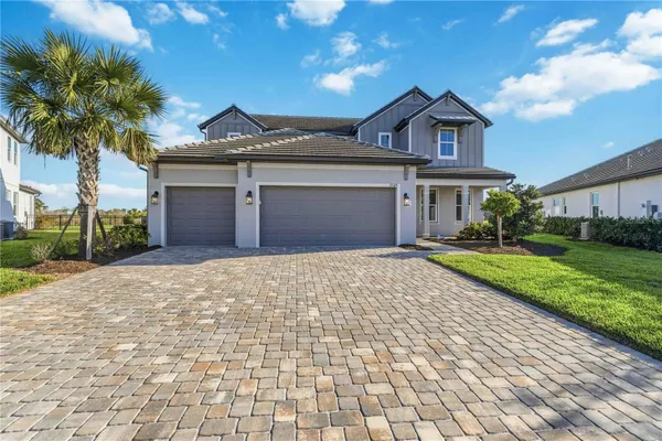 Property Slideshow image 3 of 75 | 17109 sweetwater village dr, Lakewood Ranch, FL, 34211