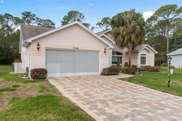 Property Slideshow image 3 of 89 | 7348 clearmeadow dr, Spring Hill, FL, 34606