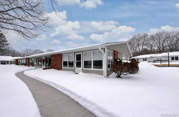 Property Slideshow image 2 of 12 | 258 newcastle ct f, Ridge, NY, 11961