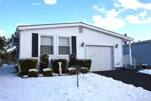 Property Slideshow image 3 of 35 | 82 village cir, Manorville, NY, 11949