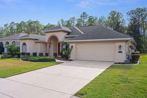 Property Slideshow image 3 of 77 | 5378 legend hills ln, Spring Hill, FL, 34609