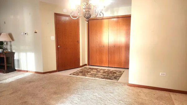 Property Slideshow image 2 of 25 | 18440 pine lake dr 1, Tinley Park, IL, 60477
