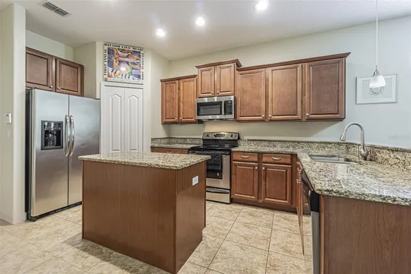 Property Slideshow image 3 of 85 | 10661 belmullet dr, San Antonio, FL, 33576