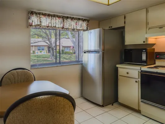 Property Slideshow image 3 of 58 | 11231 dollar lake dr 5, Port Richey, FL, 34668