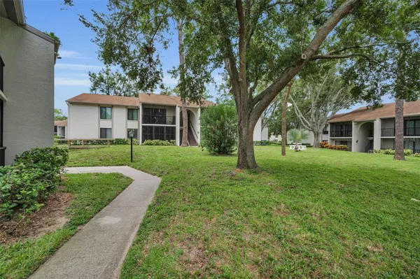 Property Slideshow image 3 of 65 | 2666 pine ridge way c2, Palm Harbor, FL, 34684