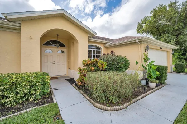 Property Slideshow image 3 of 60 | 6606 garden palm ct, New Port Richey, FL, 34655