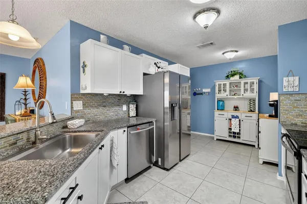 Property Slideshow image 3 of 26 | 2107 escobar ave, The Villages, FL, 32159