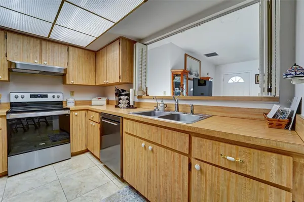 Property Slideshow image 2 of 18 | 11340 dollar lake dr 2, Port Richey, FL, 34668